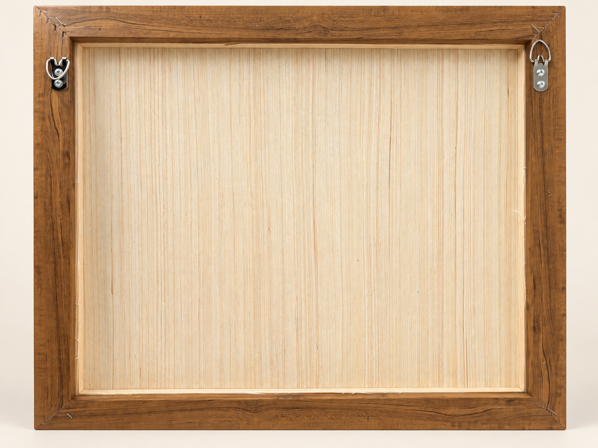 Rear view of the natural wood frame, backing panel and two metal hanging fittings